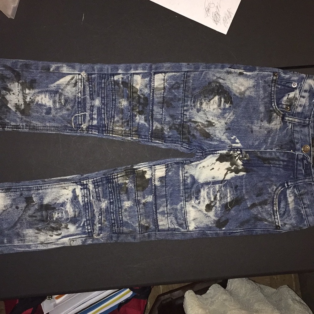 GS-115 Denim distressed blue jeans.
